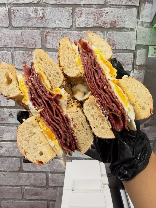 Pastrami and egg on a fresh bagel